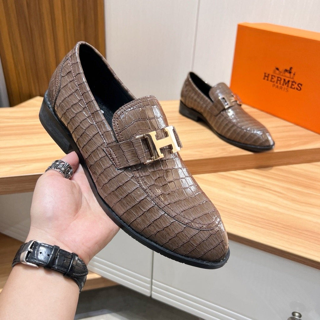 Hermès Brown Textured Loafers — model