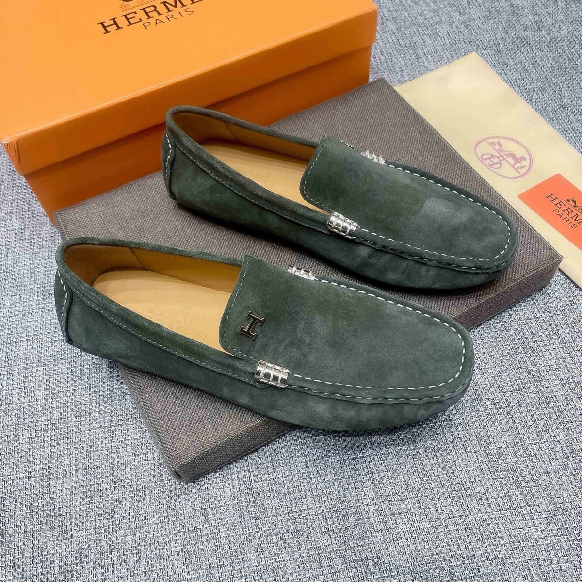 Hermès Dark Green Driving Loafers — front