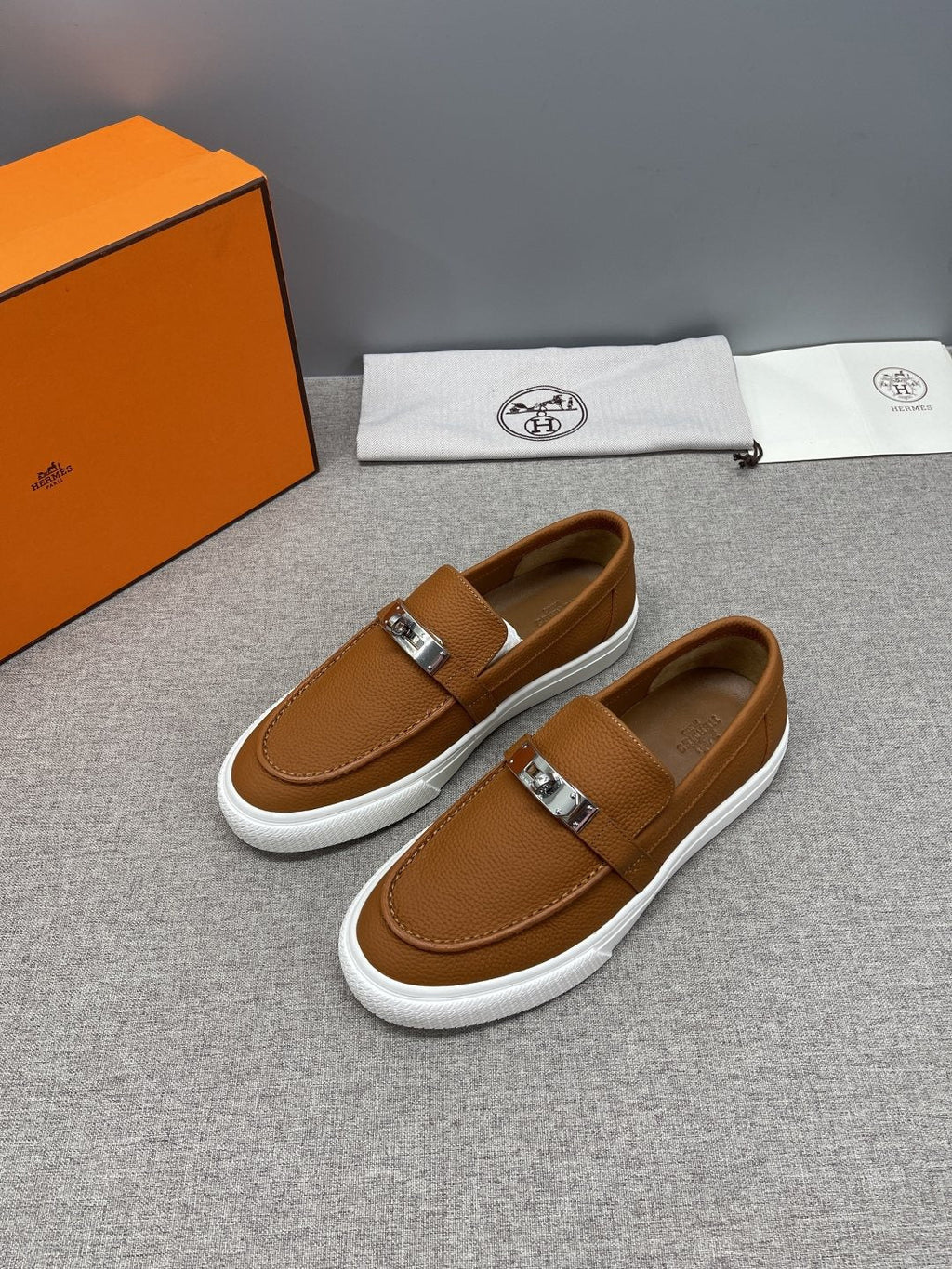 Hermès Textured Bar Loafers — side